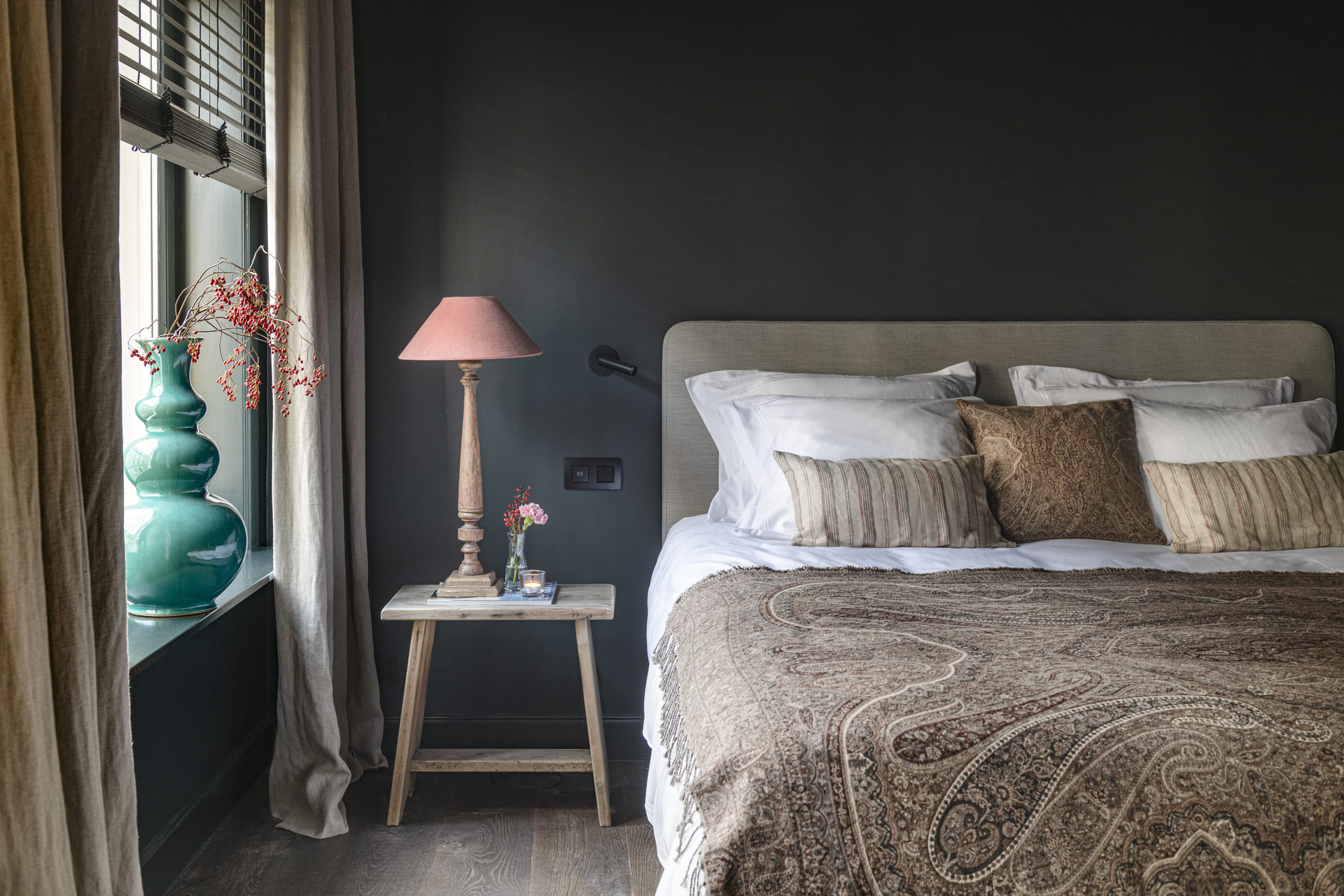 Comfortable Bed with Stylish Room Decor in Bruges Guestroom